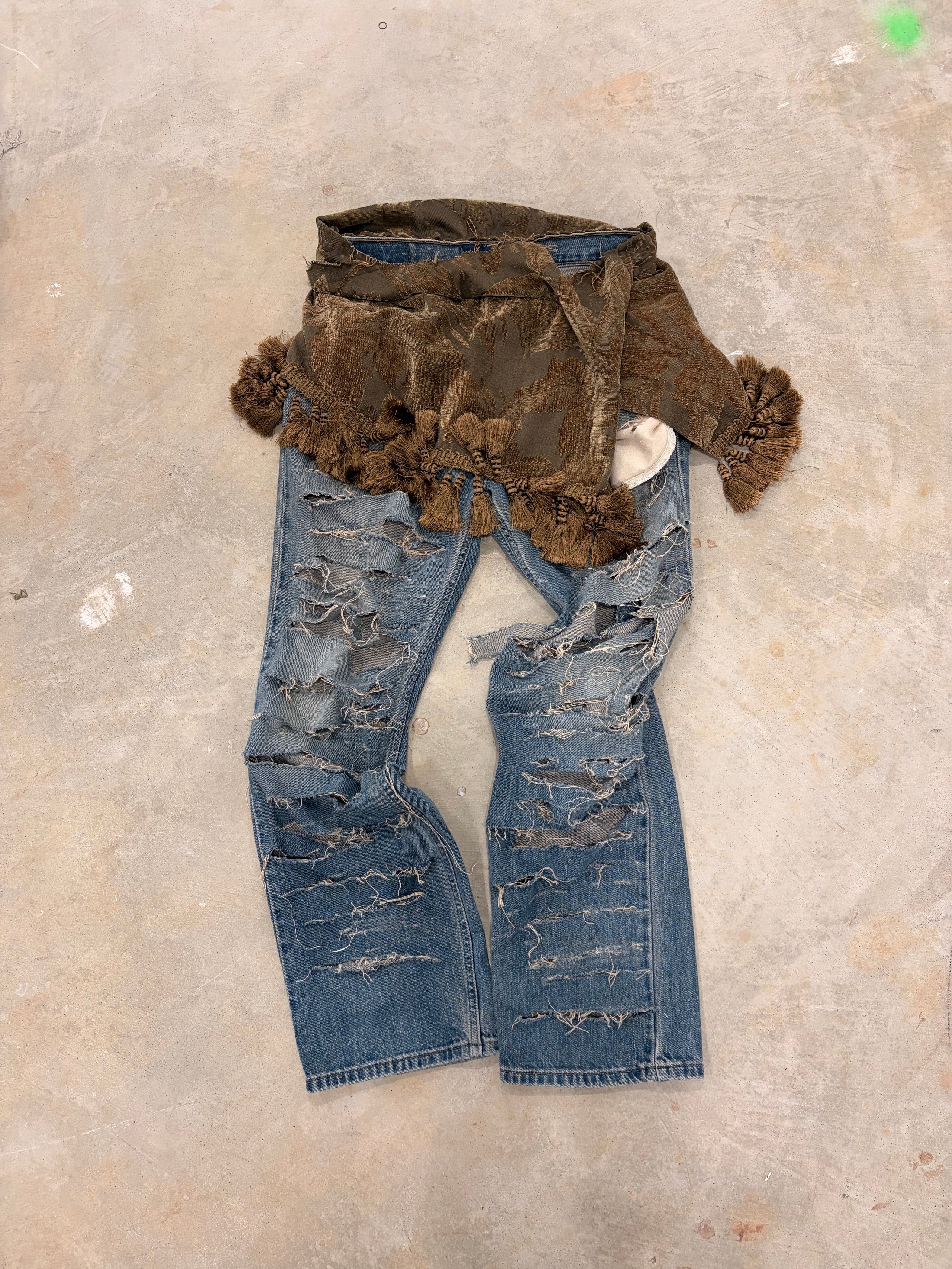 Torn tribal jeans