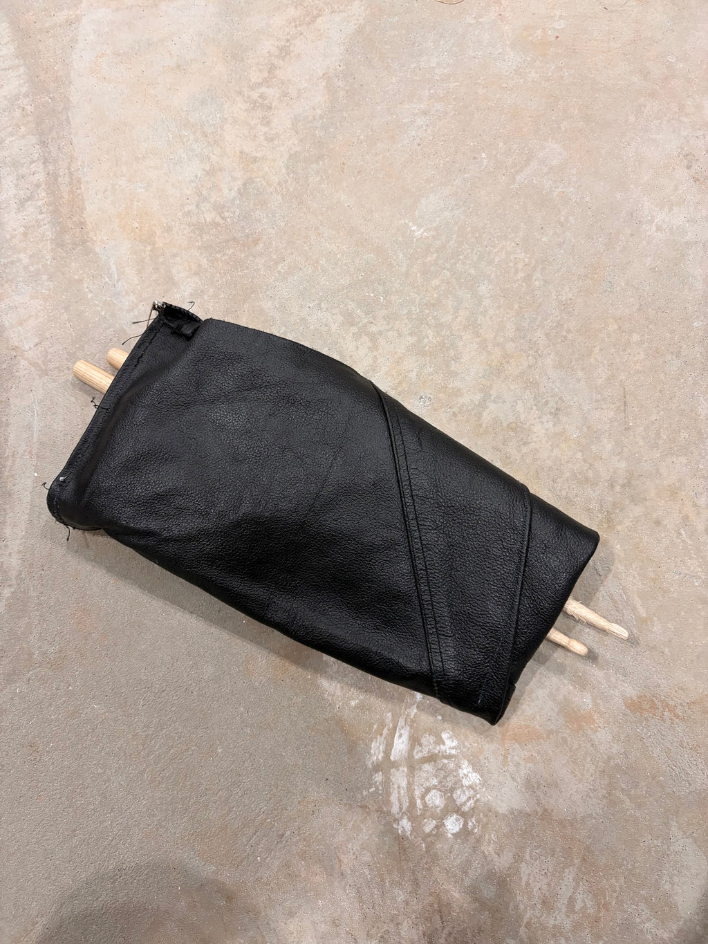 Leather sleeve drummer clutch