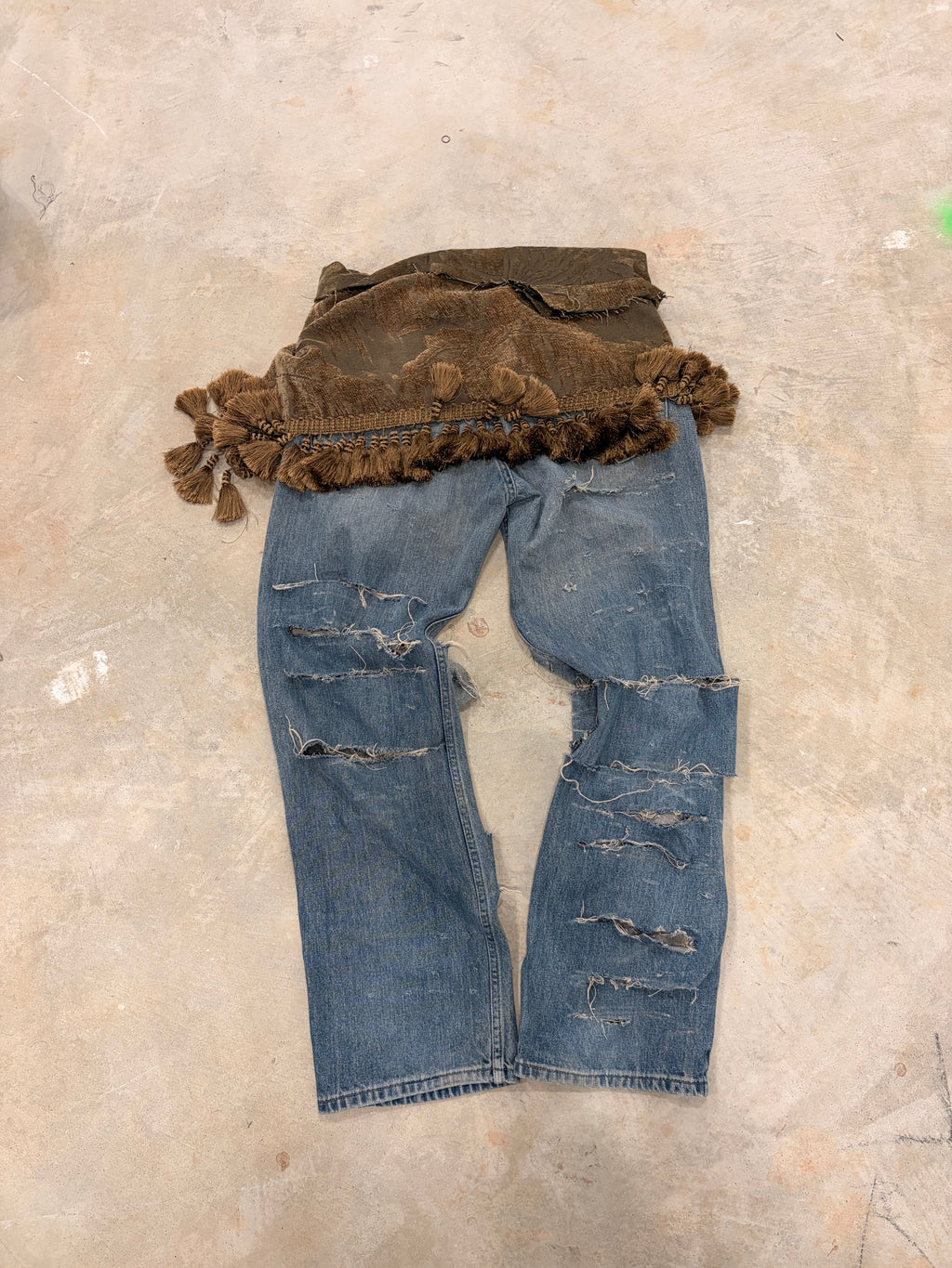 Torn tribal jeans