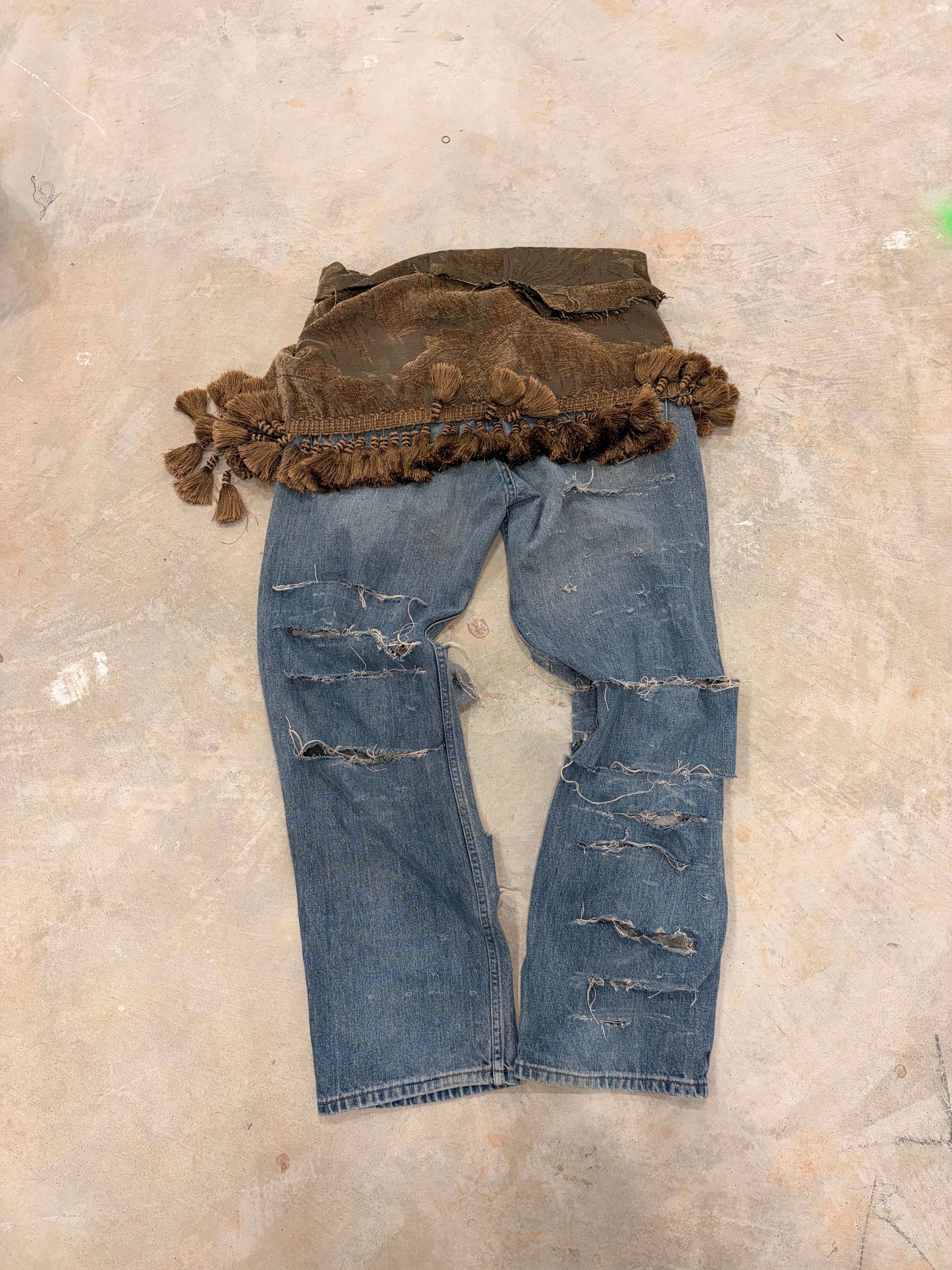 Torn tribal jeans